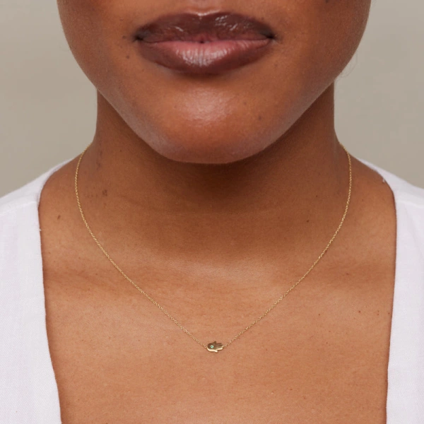 Jennifer Meyer Mini Hamsa Necklace with Emerald Center in 18K Yellow Gold | Fine Necklaces | Coveti