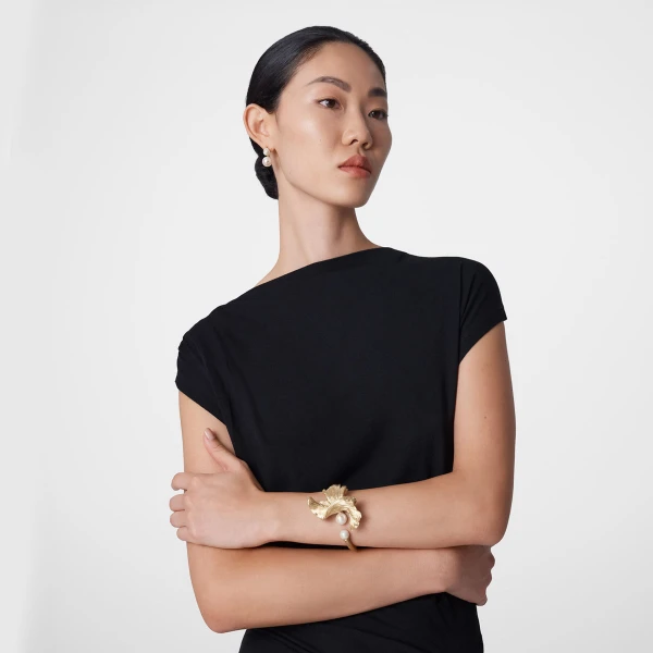 Gold and White Jimmy Choo Wave Pearl Cuff Bracelet, view 2 | Bracelets