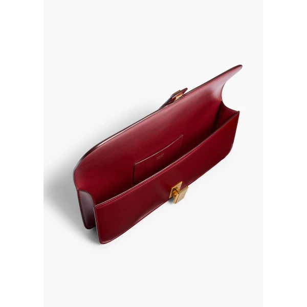 Khaite Blake Clutch in Oxblood | Clutch Bags | Coveti