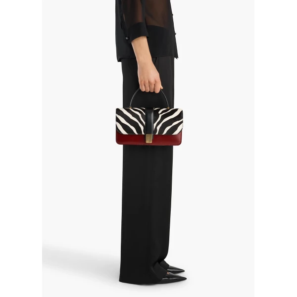 Khaite Blake Top Handle Bag in Zebra Print Haircalf and Oxblood Leather | Totes & Top-Handle Bags | Coveti