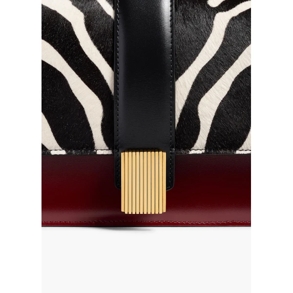Khaite Blake Top Handle Bag in Zebra Print Haircalf and Oxblood Leather | Totes & Top-Handle Bags | Coveti