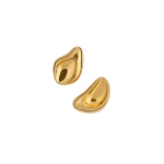 Khaite Cove Earrings in Gold | Earrings | Coveti