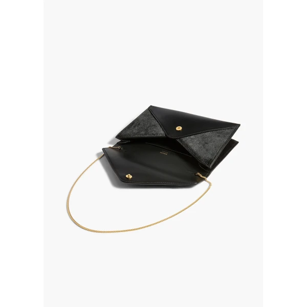 Khaite Grace Envelope Clutch in Black | Clutch Bags | Coveti