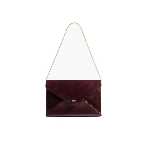 Khaite Grace Envelope Clutch in Rouge Noir | Clutch Bags | Coveti