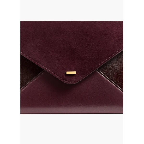 Khaite Grace Envelope Clutch in Rouge Noir | Clutch Bags | Coveti