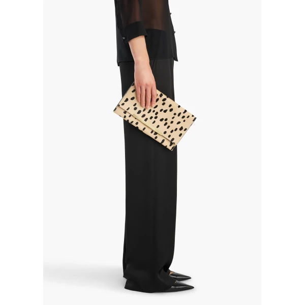 Khaite Piper Clutch in Spotted Haircalf | Clutch Bags | Coveti