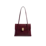 Khaite Soft Blake Small Shoulder Bag in Bordeaux | Shoulder & Crossbody Bags | Coveti