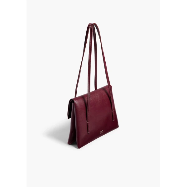 Khaite Soft Blake Small Shoulder Bag in Bordeaux | Shoulder & Crossbody Bags | Coveti