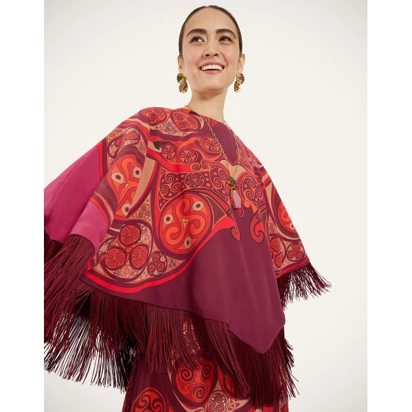 La DoubleJ Mini Poncho in Alchemy Dark Red at Coveti