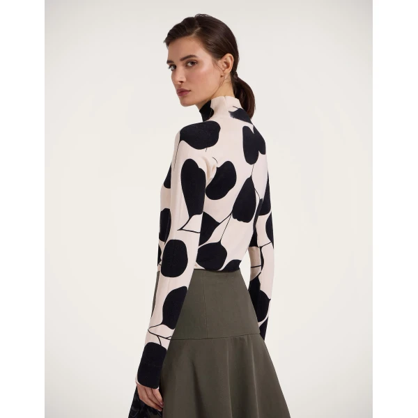La DoubleJ Silky Turtleneck in Lunaria Light Pink | Turtlenecks | Coveti