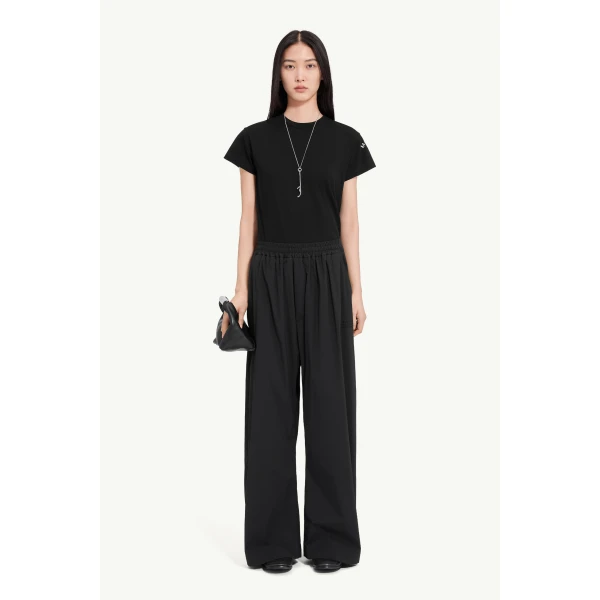 MM6 Maison Margiela Logo-Embroidered Nylon Drawstring Trousers in Black, view 2 | Sweatpants | Coveti