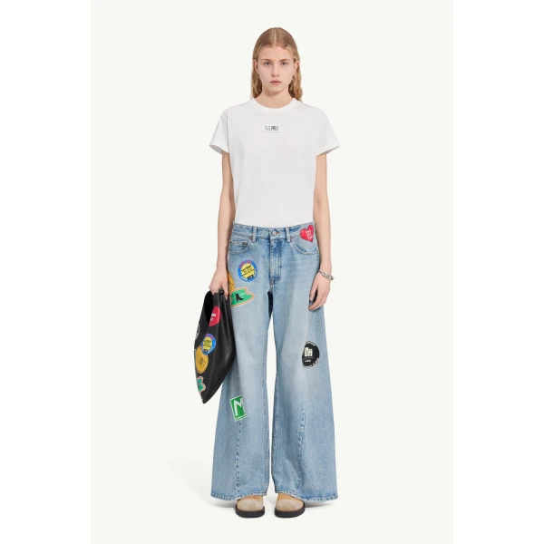 MM6 Maison Margiela Sticker-Print Wide-Leg Jeans in Blue, view 2 | Denim | Coveti