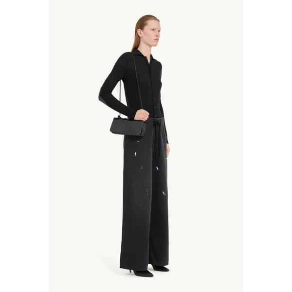 MM6 Maison Margiela Wide-Leg Jeans in Black, view 3 | Denim | Coveti