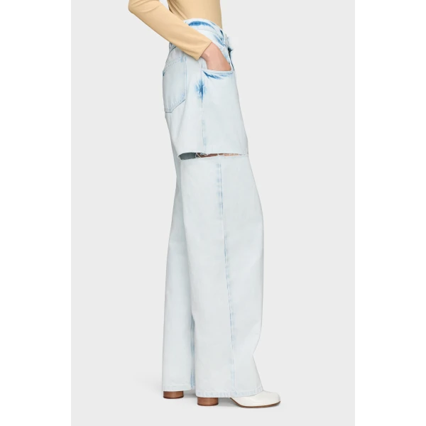 Maison Margiela Bleached Cut-Out Jeans in Light Indigo | Denim | Coveti