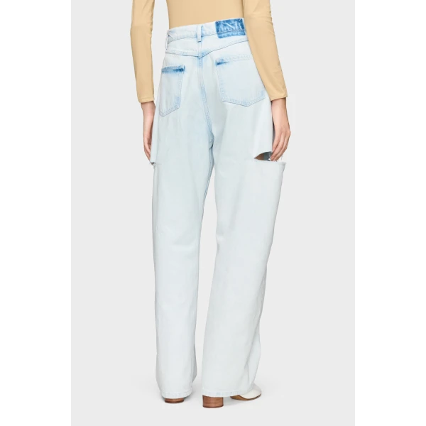 Maison Margiela Bleached Cut-Out Jeans in Light Indigo | Denim | Coveti