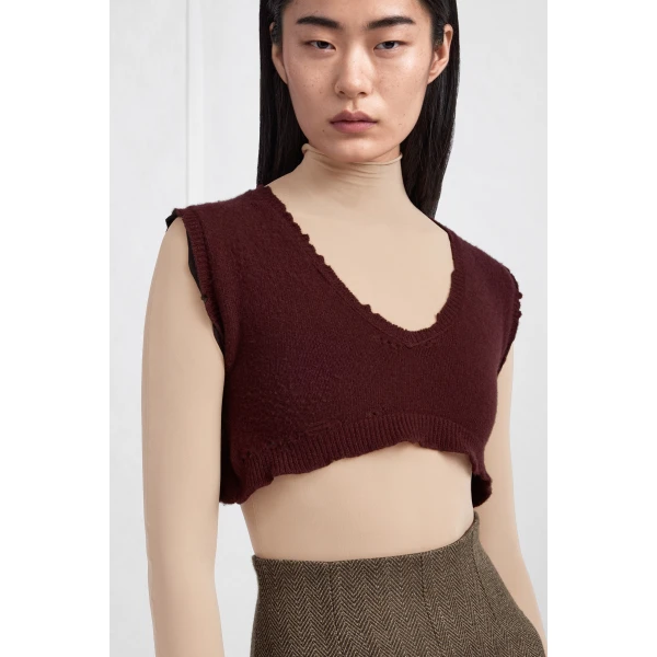 Maison Margiela Lived-In Raw-Edge Knit Vest in Bordeaux | Sweaters | Coveti