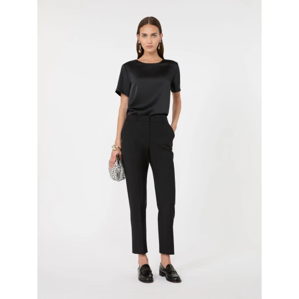 Max Mara Canon Stretch Wool Cigarette Trousers in Black | Tailored pants | Coveti