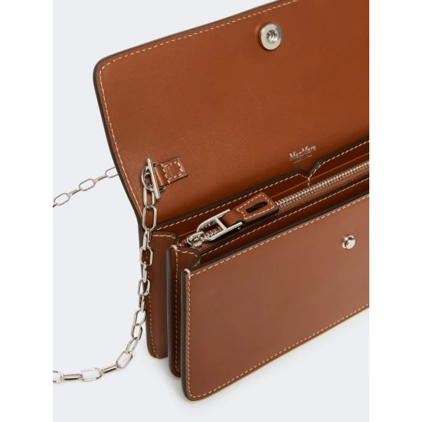 Max Mara Clutchy Leather Phone Pouch in Amber Brown | Wallets & Purses | Coveti
