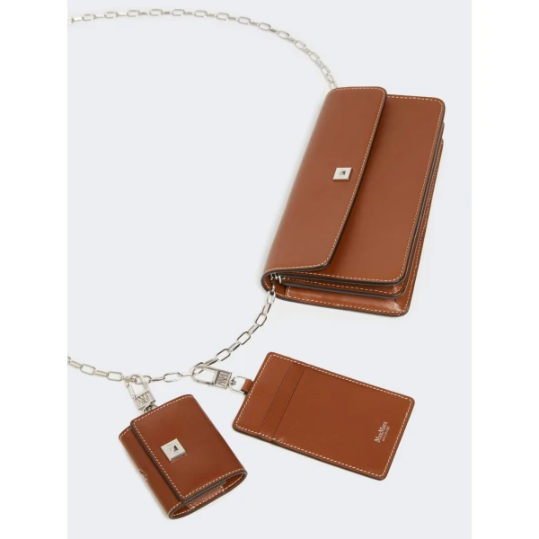 Max Mara Clutchy Leather Phone Pouch in Amber Brown | Wallets & Purses | Coveti