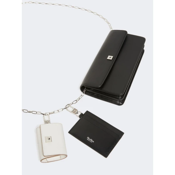 Max Mara Clutchy Leather Phone Pouch in Black | Wallets & Purses | Coveti