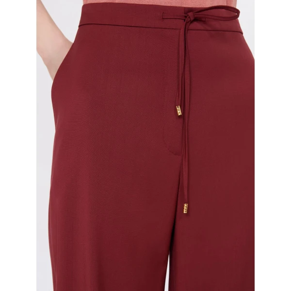 Max Mara Crisma Woollen Cloth Drawstring Trousers in Ruby | Wide leg pants | Coveti