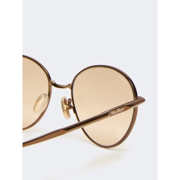 Max Mara Gestro Oval Sunglasses in Camel | Sunglasses | Coveti