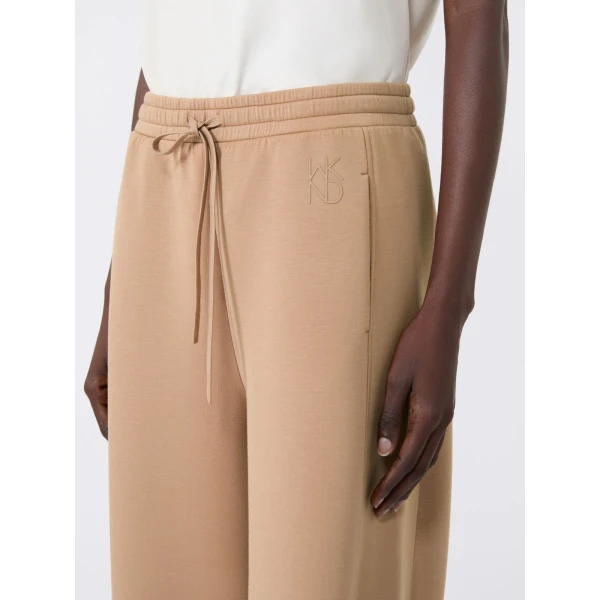 Max Mara Getto Scuba Jersey Barrel-Leg Trousers in Tobacco | Wide leg pants | Coveti