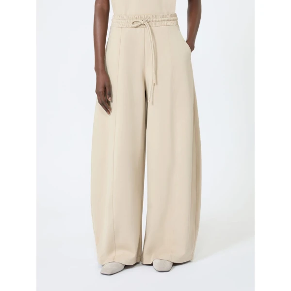 Max Mara Olmo Technical Cotton Jersey Barrel-Leg Trousers in Stone Grey | Wide leg pants | Coveti