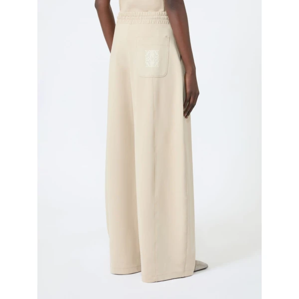Max Mara Olmo Technical Cotton Jersey Barrel-Leg Trousers in Stone Grey | Wide leg pants | Coveti