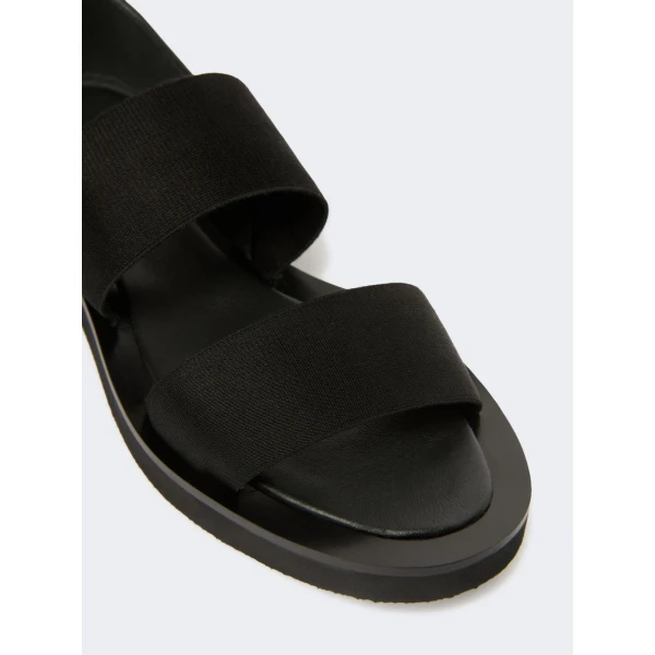Max Mara Oncia Flat Leather and Elasticated Webbing Sandals in Black | Sandals | Coveti