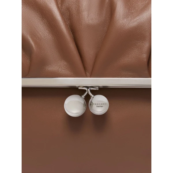 Max Mara Slalom Clutch Style Sheepskin Pasticcino Bag in Tobacco | Clutch Bags | Coveti