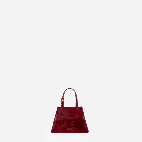 Mlouye Flex Charm in Patent Bordeaux | Bag charms | Coveti