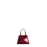 Mlouye Flex Charm in Patent Bordeaux | Bag charms | Coveti