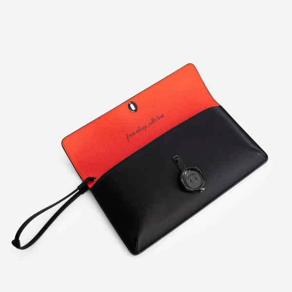 Mlouye Seal Clutch in Carbon | Clutch Bags | Coveti