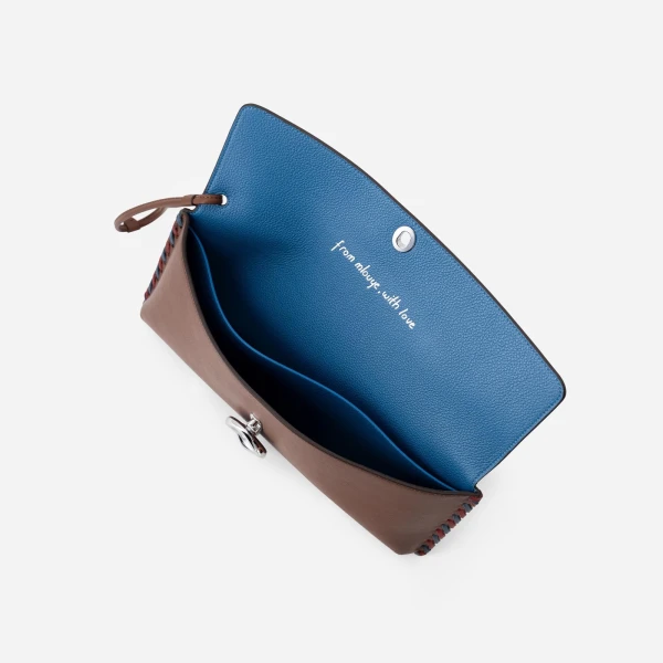 Mlouye Seal Clutch in Espresso | Clutch Bags | Coveti