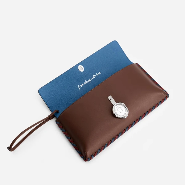 Mlouye Seal Clutch in Espresso | Clutch Bags | Coveti