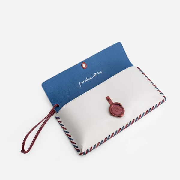 Mlouye Seal Clutch in Off White | Clutch Bags | Coveti
