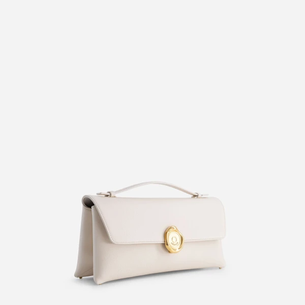 Mlouye Seal Double Clutch in Cream | Clutch Bags | Coveti