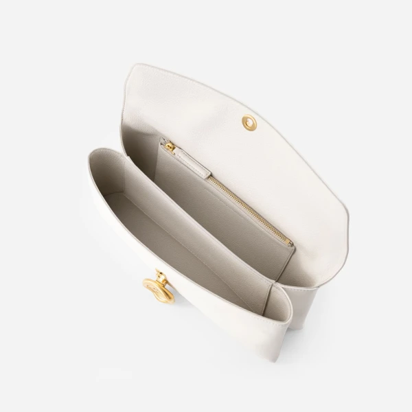 Mlouye Seal Double Clutch in Cream | Clutch Bags | Coveti
