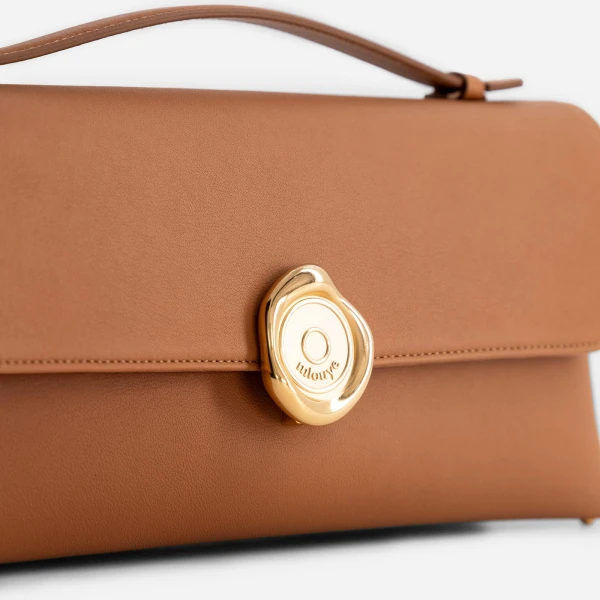 Mlouye Seal Double Clutch in Tan | Clutch Bags | Coveti