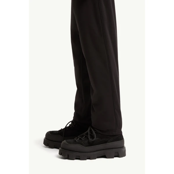 Moncler Logo Print Stretch Track Trousers in Black, view 3 | Men's Trousers | Coveti