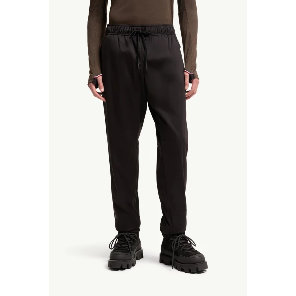 Moncler Logo Print Stretch Track Trousers in Black, view 4 | Men's Trousers | Coveti