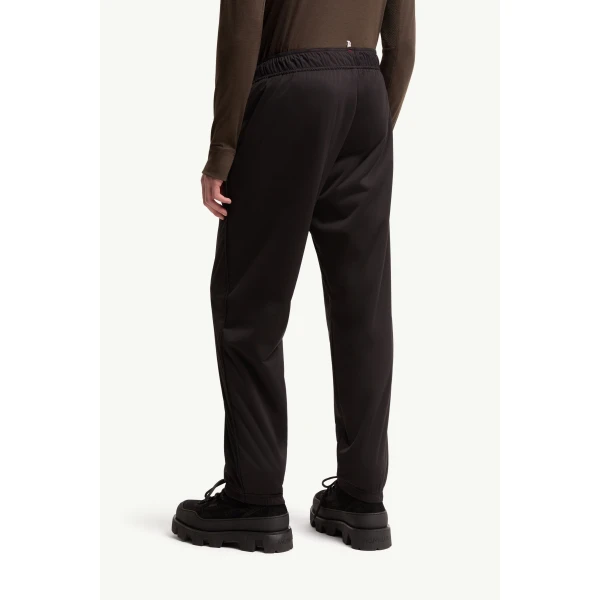 Moncler Logo Print Stretch Track Trousers in Black, view 5 | Men's Trousers | Coveti