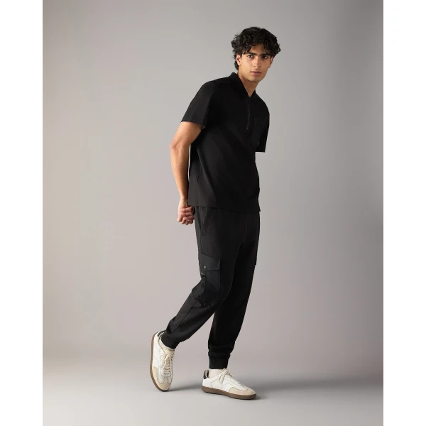 Moose Knuckles Dalon Polo in Black | T-shirts & vests | Coveti
