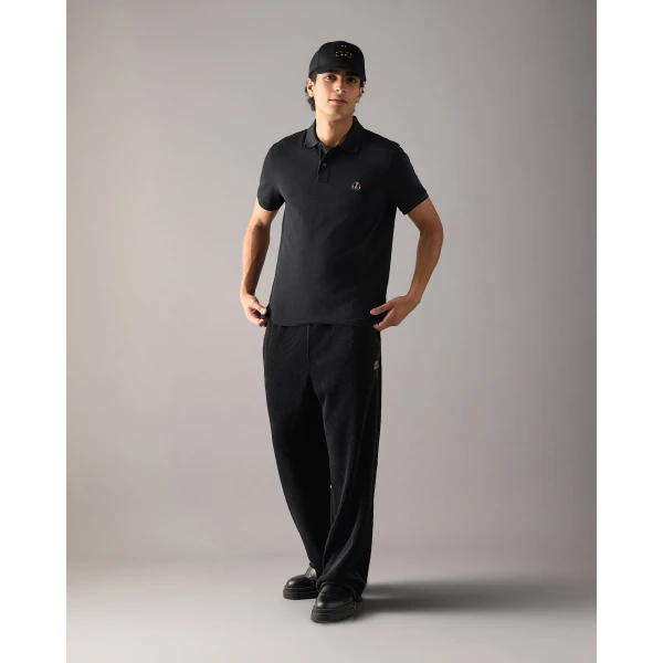 Moose Knuckles Gold Series Everett Polo in Black | T-shirts & vests | Coveti