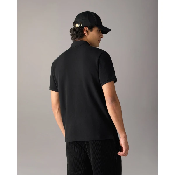 Moose Knuckles Gold Series Everett Polo in Black | T-shirts & vests | Coveti