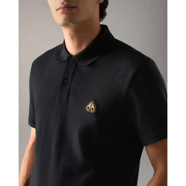 Moose Knuckles Gold Series Everett Polo in Black | T-shirts & vests | Coveti