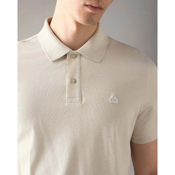 Moose Knuckles YUL Polo in Alabaster | T-shirts & vests | Coveti