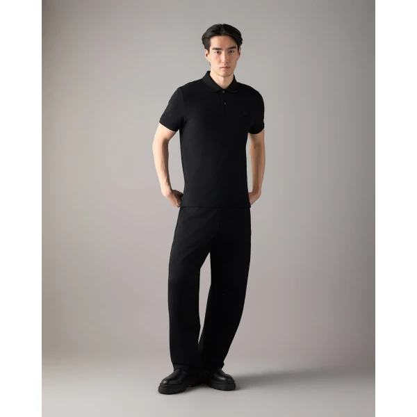 Moose Knuckles YUL Polo in Black | T-shirts & vests | Coveti