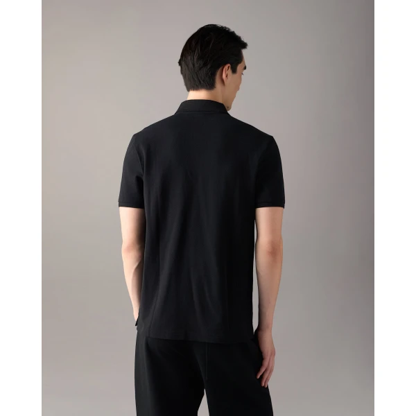 Moose Knuckles YUL Polo in Black | T-shirts & vests | Coveti